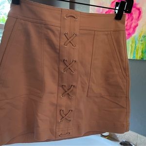 2 Express Mini skirts 1 pink &1 mock leather in burgundy